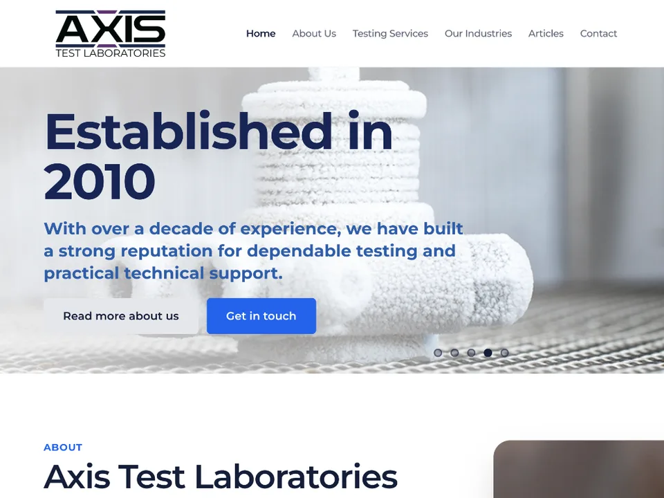 Axis Test Laboratories: custom laravel cms · uk screenshot